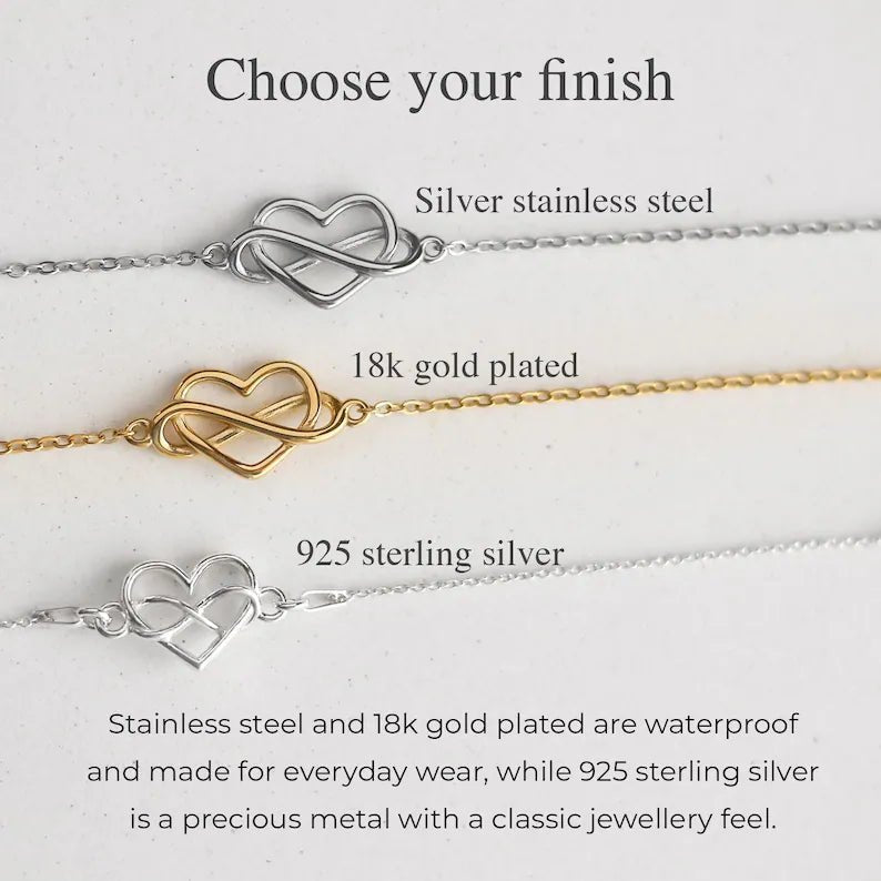 Heart infinity bracelet finish comparison showing silver stainless steel, 18k gold plated and 925 sterling silver options on a light background.