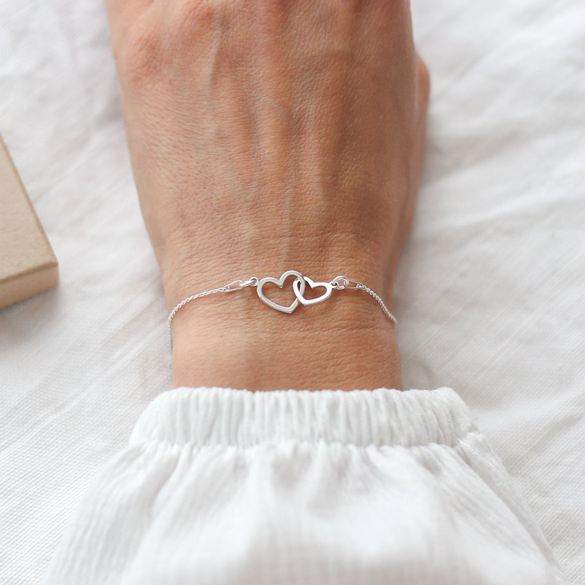 Two Interlocking Hearts Bracelet